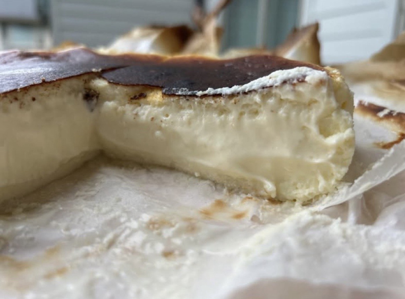The creamy interior of a plain Basque burnt cheesecake